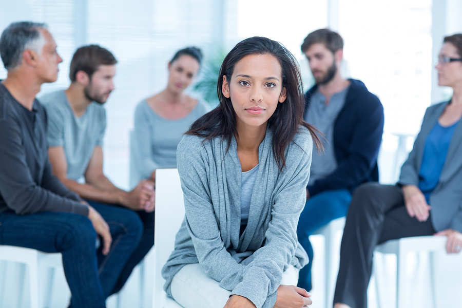 counselor in group therapy