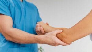 elbow injury compensation