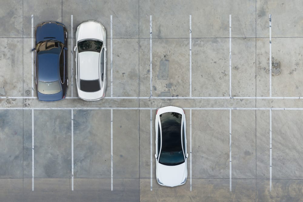 who is at fault in parking lot accident backing up