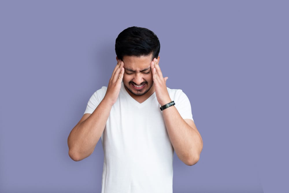 Showing the effects of severe Traumatic Brain Injury (TBI) on brain function, featuring highlighted areas of damage and corresponding symptoms.