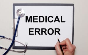 Chicago attorney discussing failure to diagnose cases with a client in an office setting.