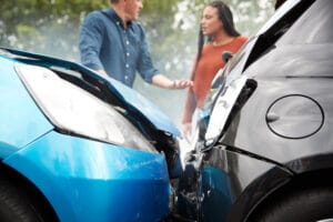 Chicago Electric Vehicle Accident Lawyer consulting with a client.