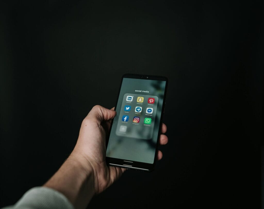 Smartphone displaying social media apps that can be used as evidence in personal injury cases