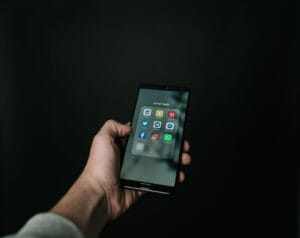 Smartphone displaying social media apps that can be used as evidence in personal injury cases