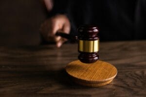 Gavel striking a sound block in courtroom representing personal injury law myths exposed